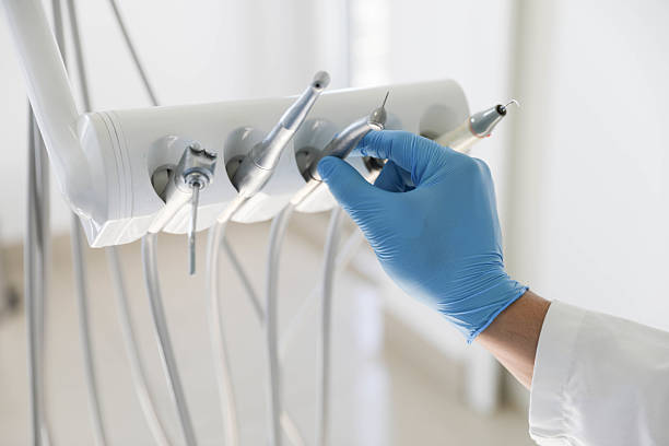 Professional Tooth Extraction technician working in Alexandria, LA